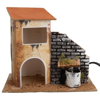 Casa con fuente funcionando cm 19x13,5x18 h.