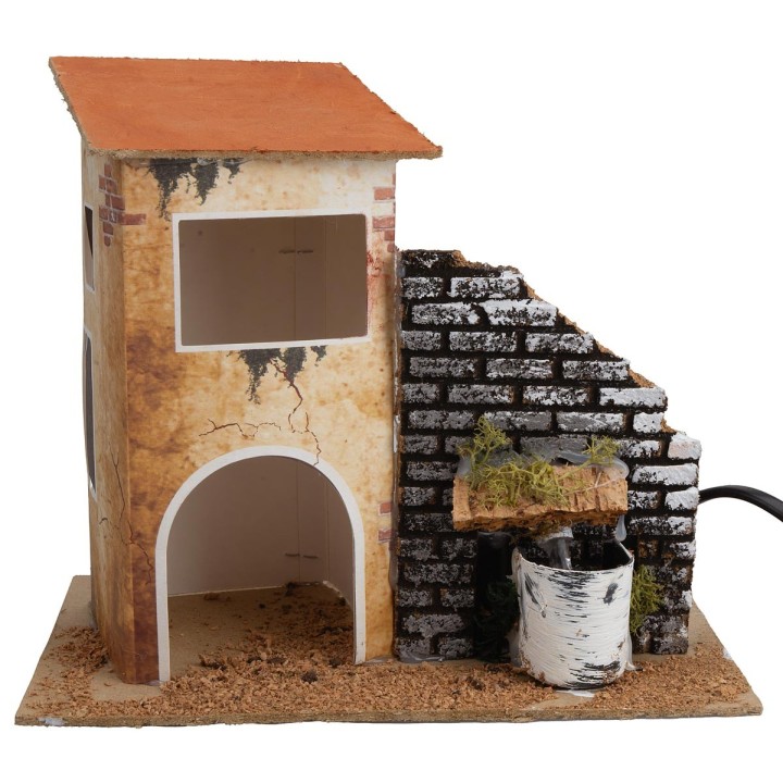 Casa con fuente funcionando cm 19x13,5x18 h.