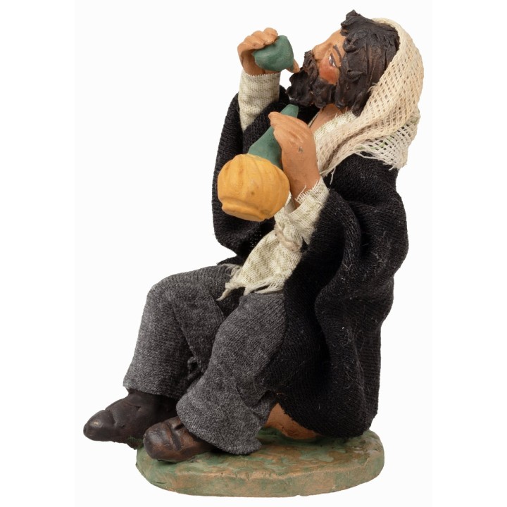 Uomo seduto che beve serie 12 cm