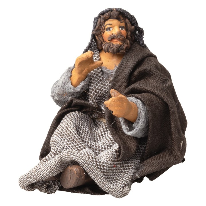 Vendedor sentado serie 10 cm