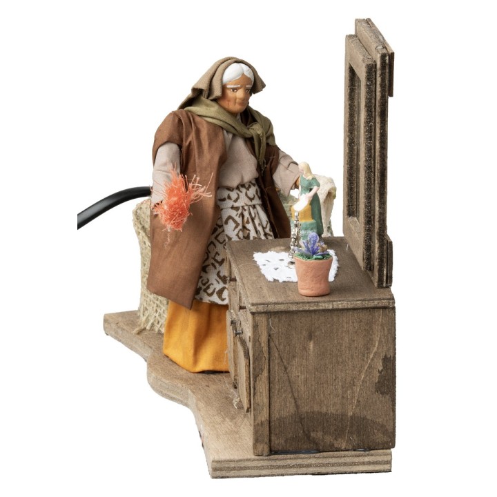 Woman dusting the dresser in motion series 12 cm