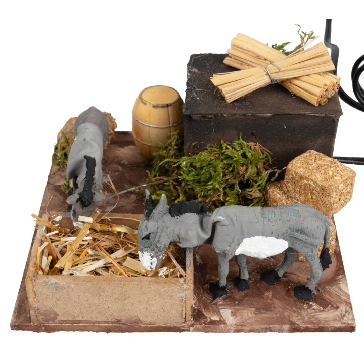 Pair of donkeys at the manger with double movement for nativity