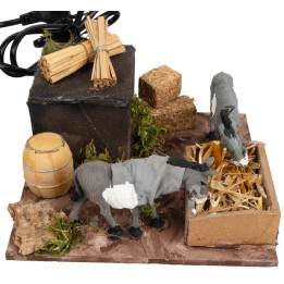 Pair of donkeys at the manger with double movement for nativity