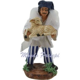 Man with sheep in arm cm 10